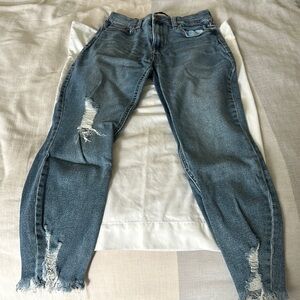 Distressed Blue Jeans